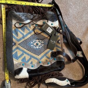 Myra Cow print fringe bag